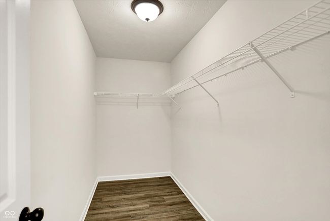 primary bedroom walk-in closet | Image 17