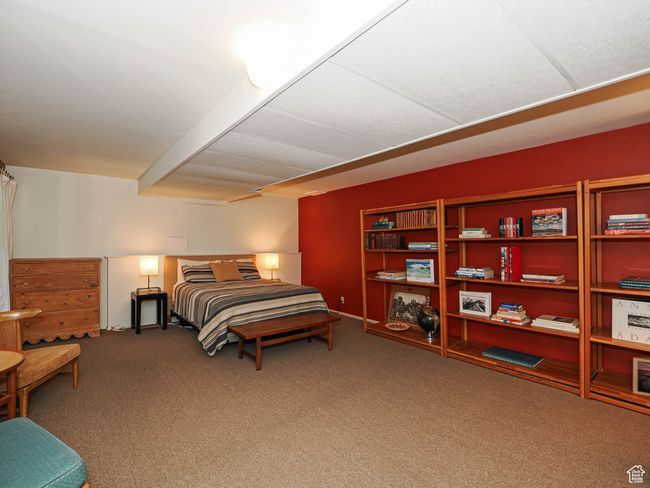 Bedroom featuring carpet and beam ceiling | Image 46