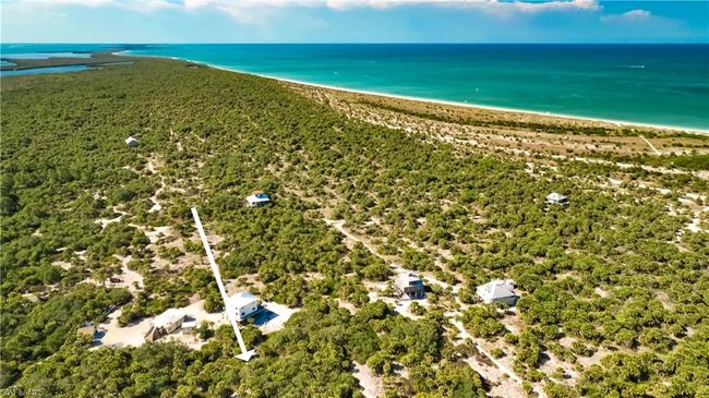 Aerial view with a view of the beach and a water view | Image 11