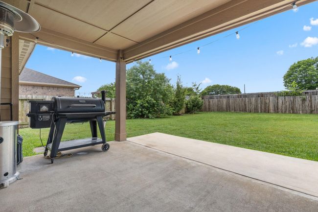 Covered patio just off the kitchen | Image 26