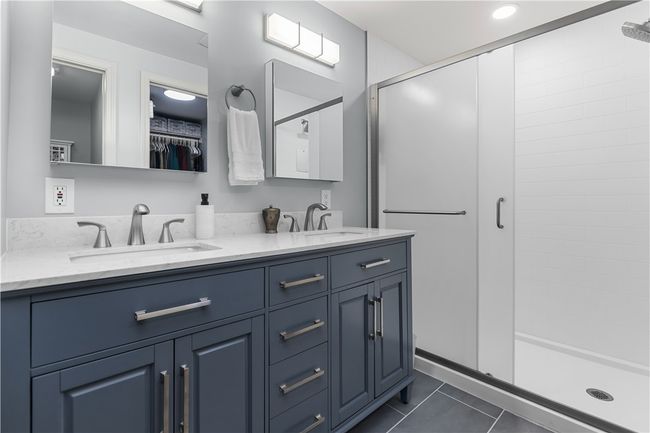 Beautiful updated primary bathroom with separate water closet | Image 20