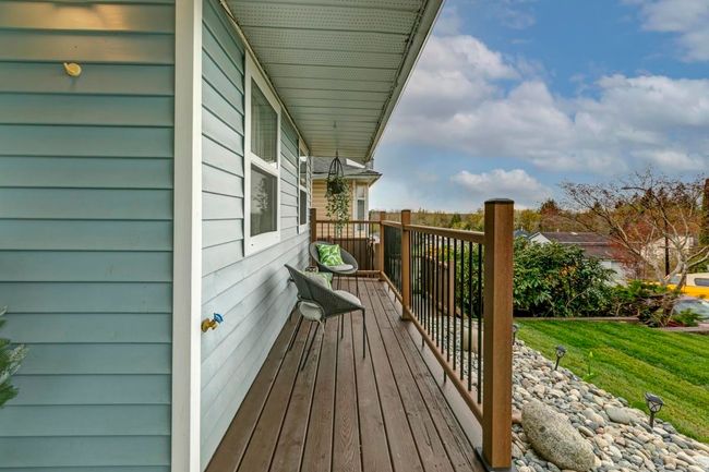 Wooden deck with a yard | Image 30