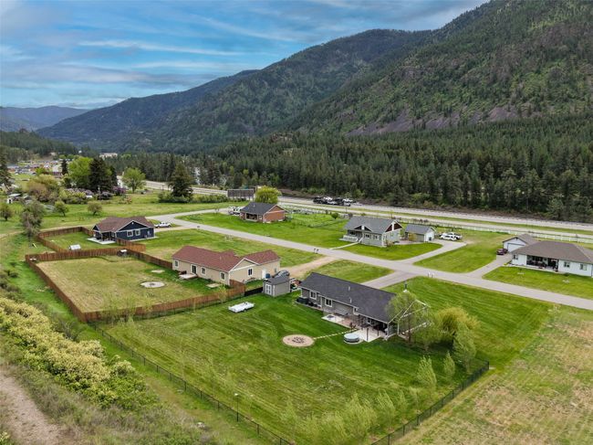Aerial view of a mountainous background and a heavily wooded area | Image 36