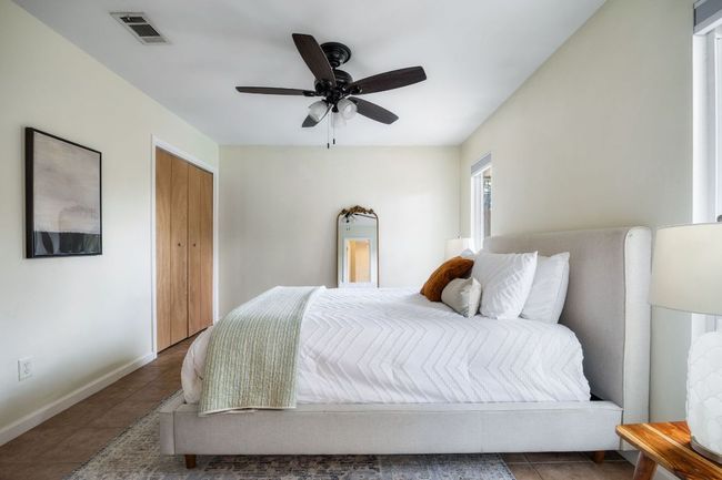 Primary bedroom with his and hers closets | Image 25