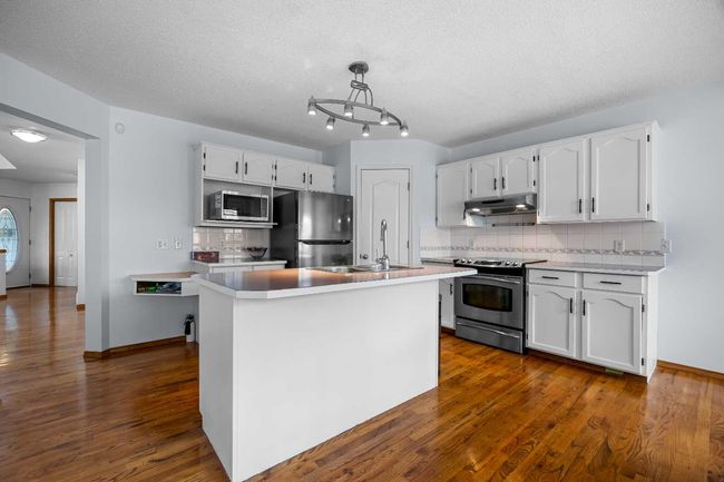 240 Arbour Ridge Way Nw, House other with 6 bedrooms, 4 bathrooms and 4 parking in Calgary AB | Image 8