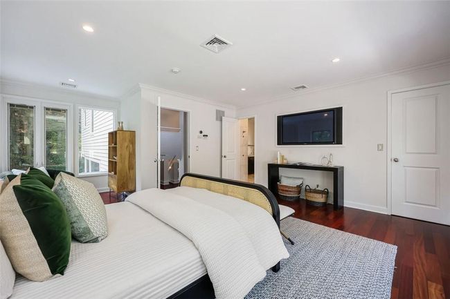 Bedroom featuring dark hardwood / wood-style flooring and ornamental molding | Image 15