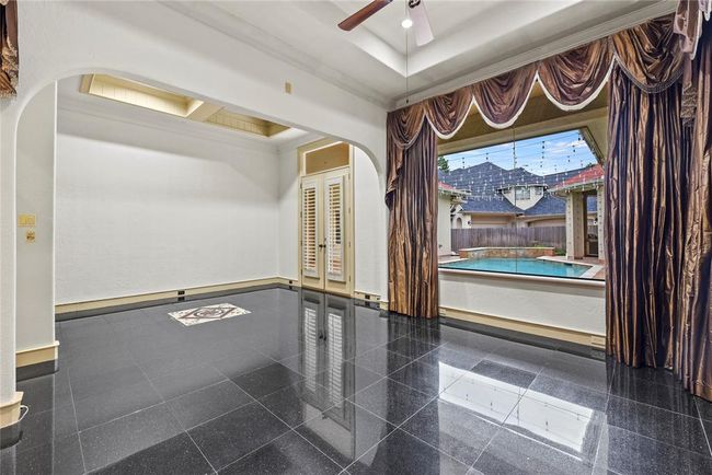 Formal Dining & Study area over looks your beautiful pool! | Image 12