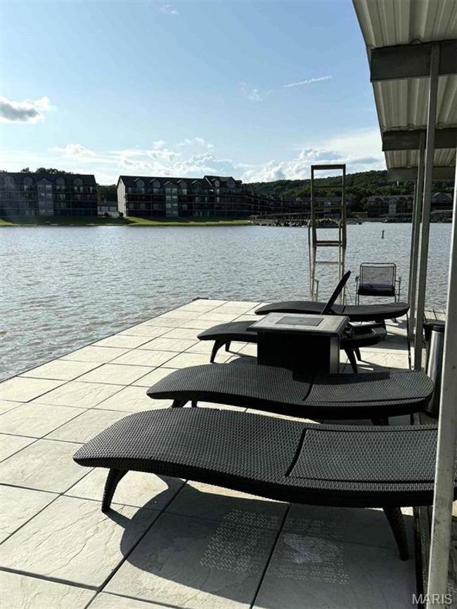Dock featuring a water view | Image 33