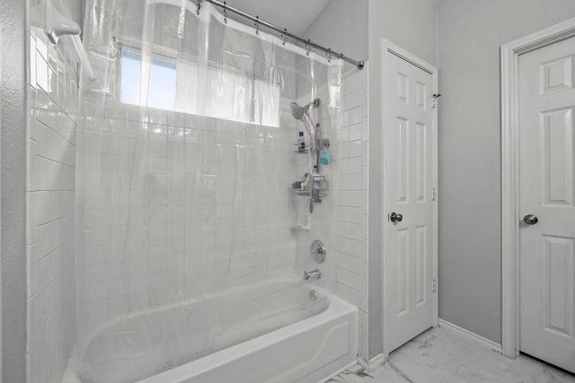 Bathroom featuring tile finish floors | Image 16