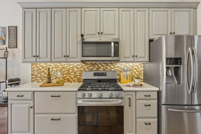 All stainless-steel appliances. Refrigerator conveys with home. | Image 14