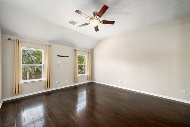 An additional living space game room welcomes you at the top of the stairs | Image 28