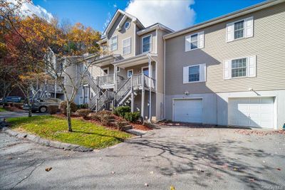 View of front of property with a garage | Image 2