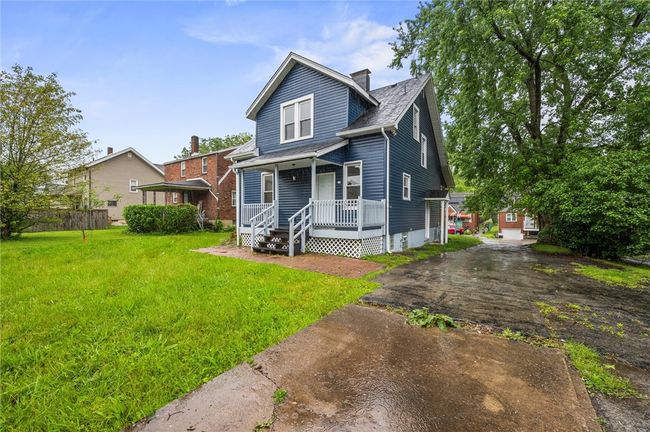 Enjoy the benefit of a long, private driveway with room to park up to 4 vehicles comfortably. | Image 23