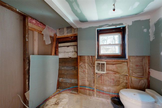 Bathroom featuring toilet | Image 13