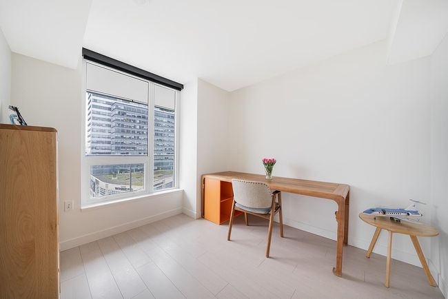 Office space with baseboards and wood finished floors | Image 9
