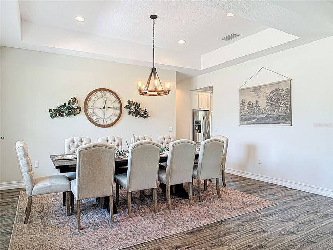 foyer looking into formal dining room | Image 10