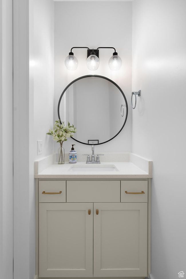 Main floor half bathroom with vanity | Image 20