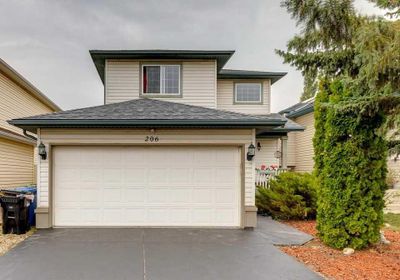 206 Harvest Creek Close Ne, House detached with 3 bedrooms, 2 bathrooms and 4 parking in Calgary AB | Image 1