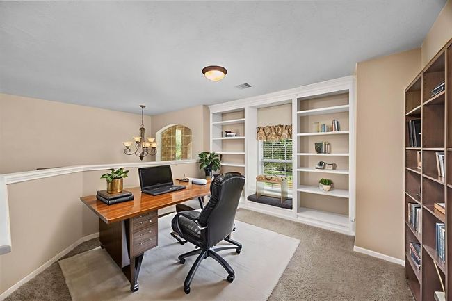 This image has been virtually staged so you can see a possible furniture layout for your new home. | Image 25