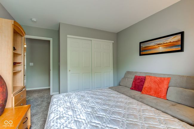 bedroom with carpet and a closet | Image 16