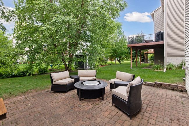 The backyard paver patio measures 18x16 and is a great place to relax | Image 26