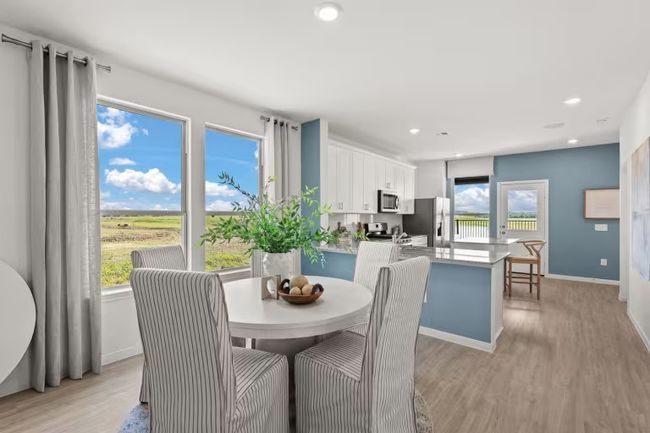 Photo of Pulte model home with same floor plan, not of actual home listed. | Image 6