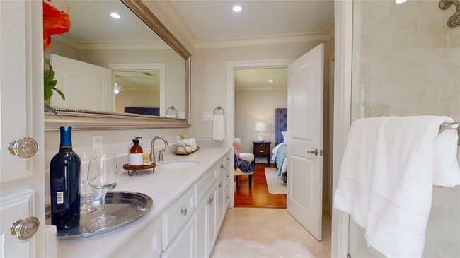 Primary Bath with Marble Counters and Flooring Currently Destaged | Image 30
