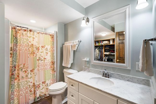 Primary main floor bedroom 3/4 ensuite bath | Image 12