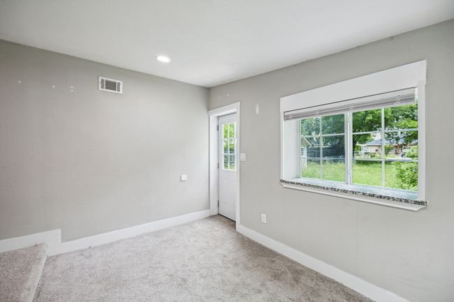 Unfurnished room with light colored carpet and recessed lighting | Image 20