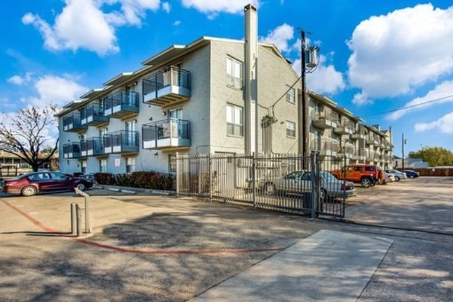 View of building exterior with fence | Image 5