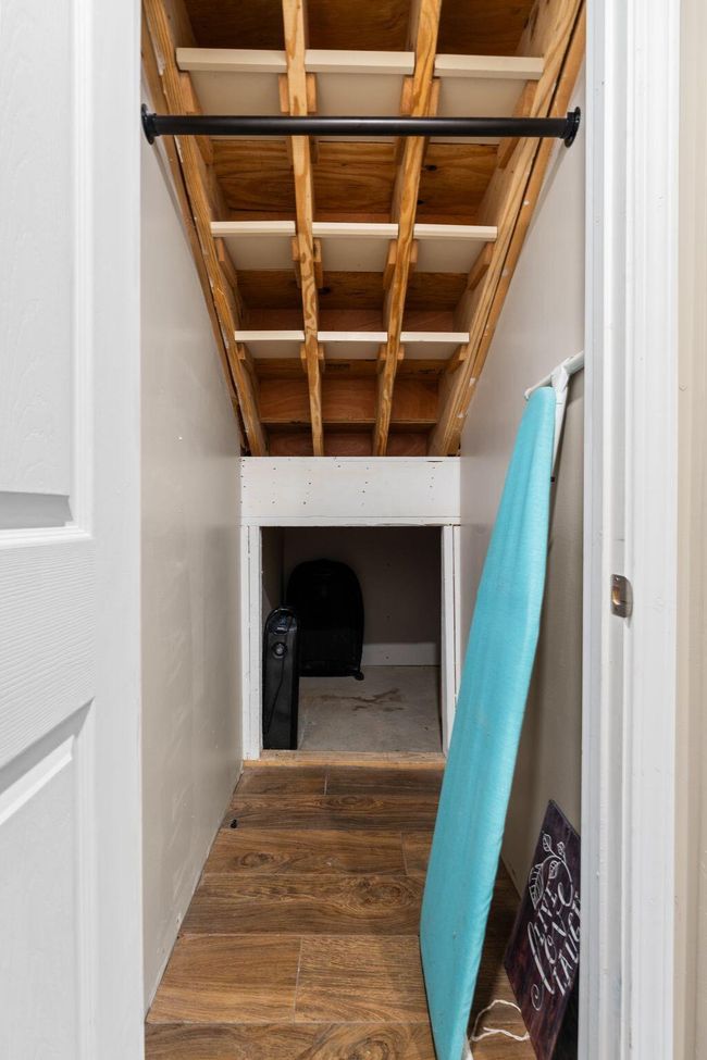 Under stair storage closet. | Image 42