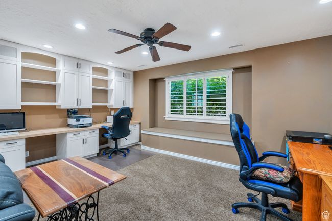Home office with recessed lighting, ceiling fan, and built in desk | Image 17