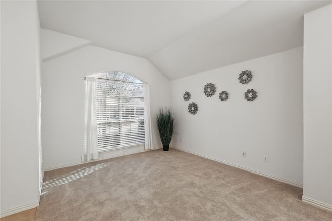 Abundantly ventilated formal living space overlooking the front yard. | Image 4