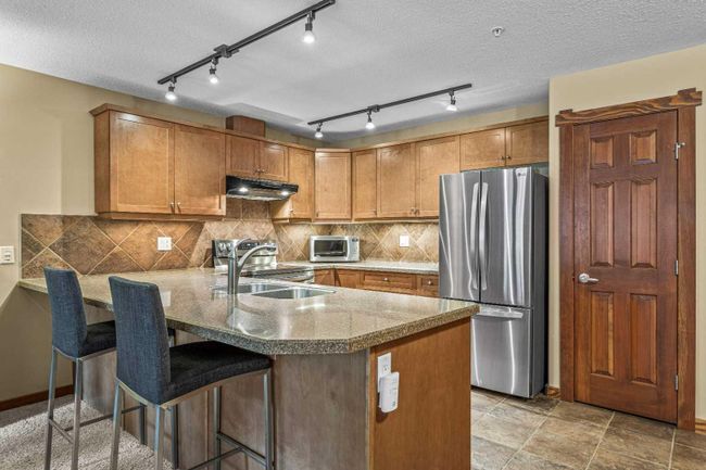 311 - 150 Crossbow Place, Home with 2 bedrooms, 2 bathrooms and 2 parking in Canmore AB | Image 6