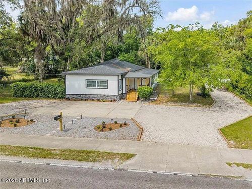 1956 Pioneer Trl, New Smyrna Beach, FL, 32168-8004 | Card Image