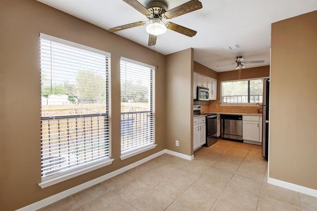 The dining area, between living room and kitchen is sizeable for a longer table | Image 11