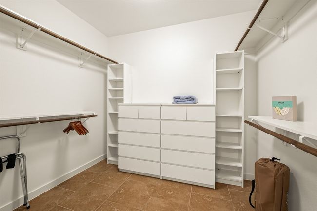 View of spacious closet | Image 19