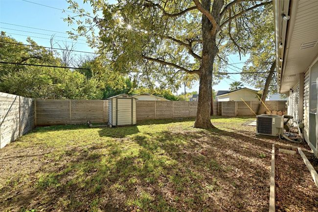 The backyard includes a storage shed, perfect for all of your outdoor tools and toys. | Image 31