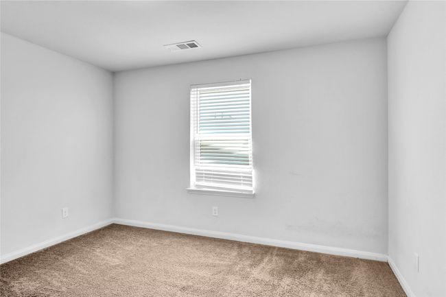 Carpeted spare room with baseboards and visible vents | Image 19