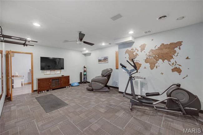 Exercise room featuring carpet flooring, recessed lighting, and ceiling fan | Image 54