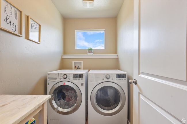 Laundry room with independent washer and dryer and laundry area | Image 9