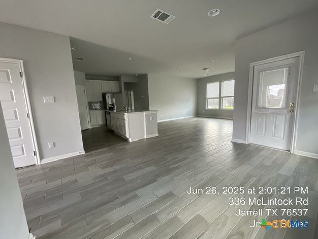 Open floor plan, dining to kitchen to family room | Image 4