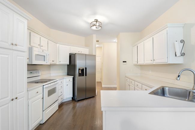 New lighting, paint, kitchen sink, and faucet | Image 13