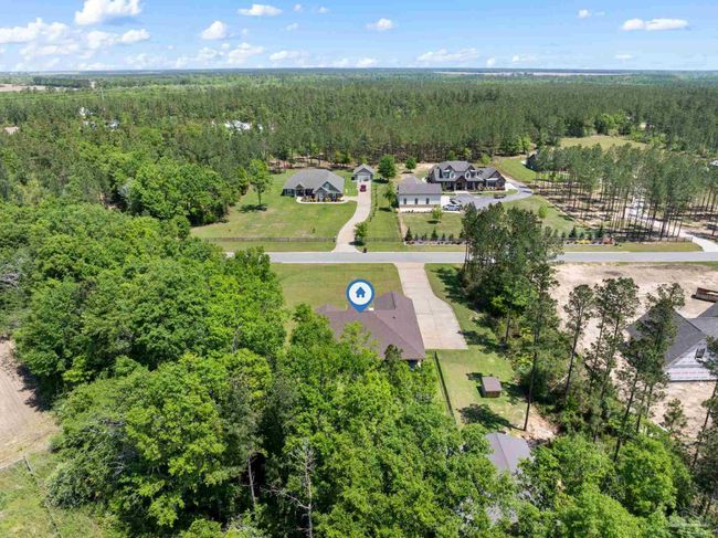 9241 Sage Forest Ln, House other with 3 bedrooms, 3 bathrooms and 2 parking in Pace FL | Image 54