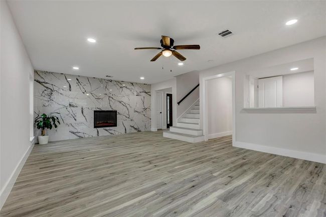 Spectacular living room with a lovely electric fireplace for a few freezing days in the winter. | Image 9