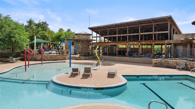 The amenity center offers a pool for every age—plus a generous shaded pavilion for comfortable gathering and relaxation. | Image 36