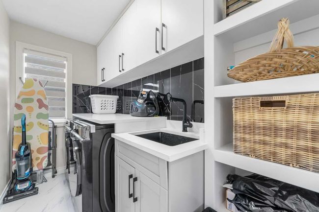 316 Kinniburgh Link, House other with 5 bedrooms, 4 bathrooms and 6 parking in Chestermere AB | Image 38