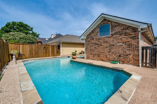 Back patio and pool. | Image 25