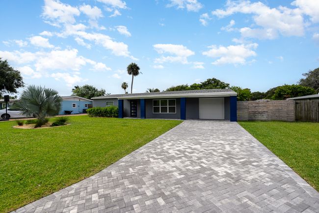 The beautiful paver driveway offers plenty of parking. | Image 9
