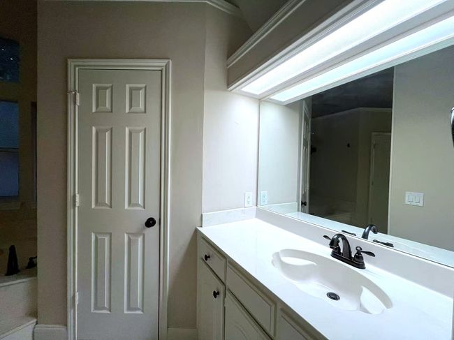 Bathroom featuring vanity | Image 29